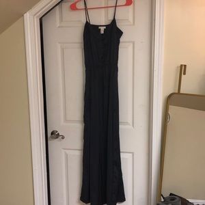 Long dark silver dress.